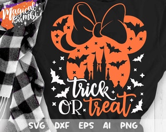 May include: Black t-shirt with an orange silhouette of Mickey Mouse ears with a bow, a castle, and bats. The text "trick or treat" is written in white below the silhouette.