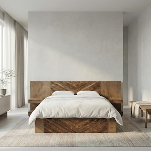 May include: A contemporary bedroom featuring a wooden bed with a chevron-patterned headboard. The bed is made up with white linen. The room has a neutral colour scheme, with a rug and a wooden bench.