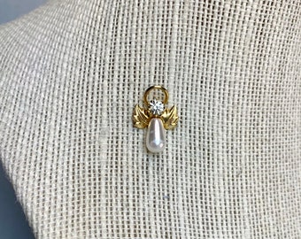 Vintage angel brooch pin with swirly pattern /& butterfly wings silver tone metal with white faux pearl ; about 1 12 x 1 in.