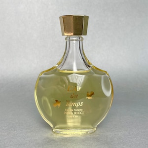 Vintage L’ Air du Temps Nina Ricci Perfume: 50 ml Glass Figural Bottle