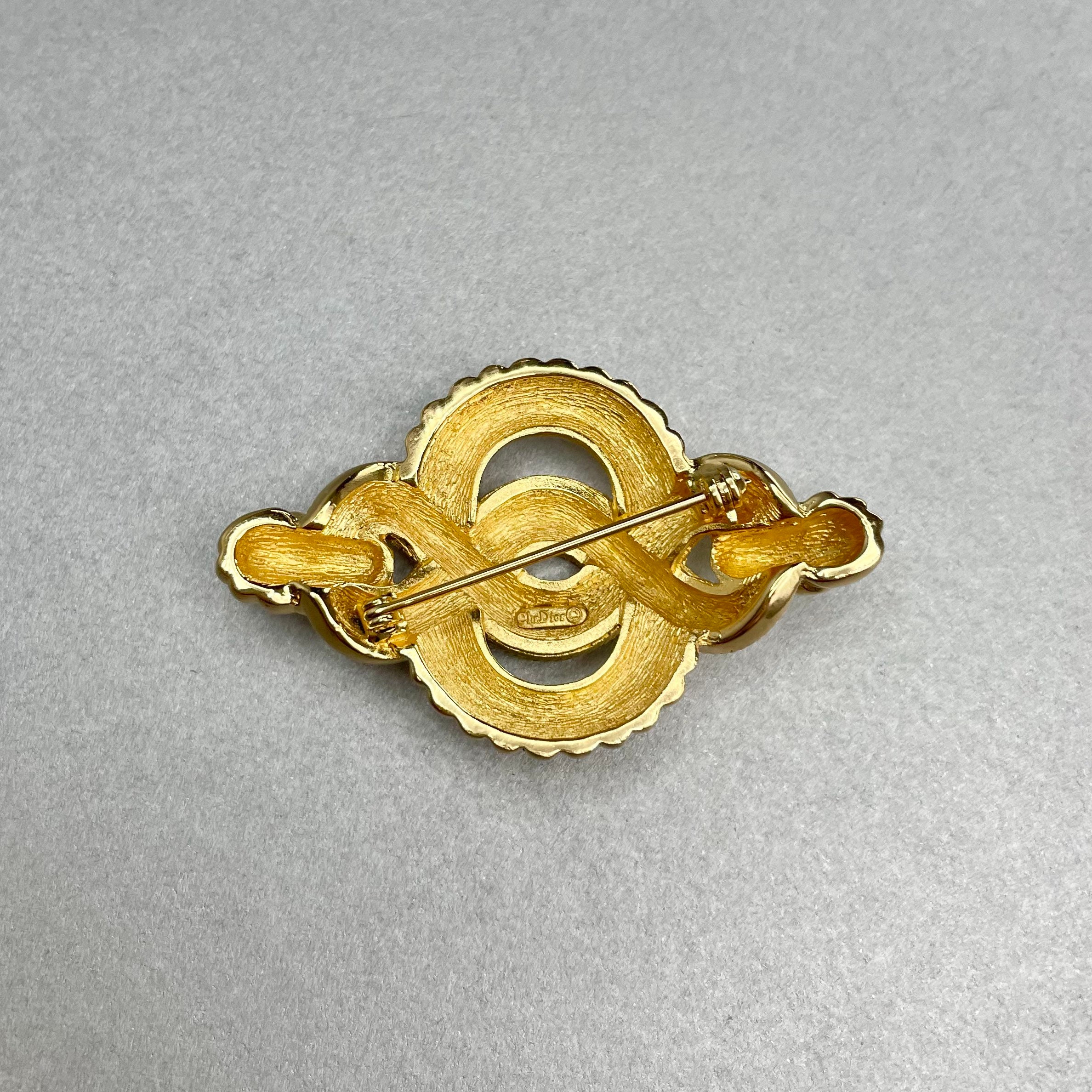 Christian Dior Designer Costume Jewelry Pins, 2 for sale at auction on 8th  October