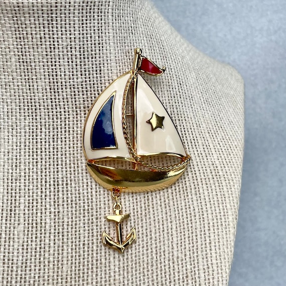Vintage Avon Sailboat Pin, Gold Tone White Navy B… - image 1
