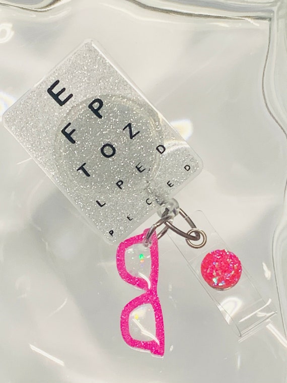 Eye Chart Badge Reel, Pink Glasses, Retractable Swivel Alligator