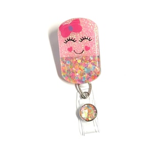 Happy Pill Badge Reel: 2”, Pink with Pink Bow, Retractable Swivel Alligator Clip, Nurse, Pharmacy image 1