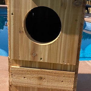 Great horned or barred owl house made from Cedar