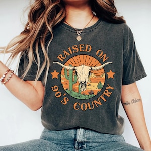 raised on 90's country shirt, country music shirt, country shirts, western shirt, western graphic tee, country concert shirt bull skull