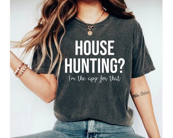 Może przedstawiać: Szary t-shirt z nadrukiem "HOUSE HUNTING? I'm the app for that" w kolorze białym.