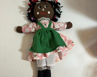 New with tags 11 inch Rasta stuffed doll with dress and apron