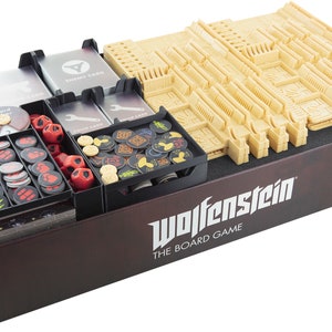 May include: A brown cardboard box with a black foam insert for organising board game components. The box has the text "Wolfenstein The Board Game" printed on the front. The foam insert has compartments for cards, tokens, dice, and other game pieces.
