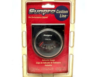Sunpro CP7985 CustomLine Electrical Voltmeter 2" Black Face 12V Vintage NOS