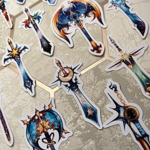 May include: A set of 10 colourful fantasy sword stickers with a galaxy theme. The stickers feature a variety of sword designs, including a crescent moon sword, a double-bladed axe, and a sword with a star at the tip. The stickers are perfect for adding a touch of fantasy to your laptop, water bottle, or planner.