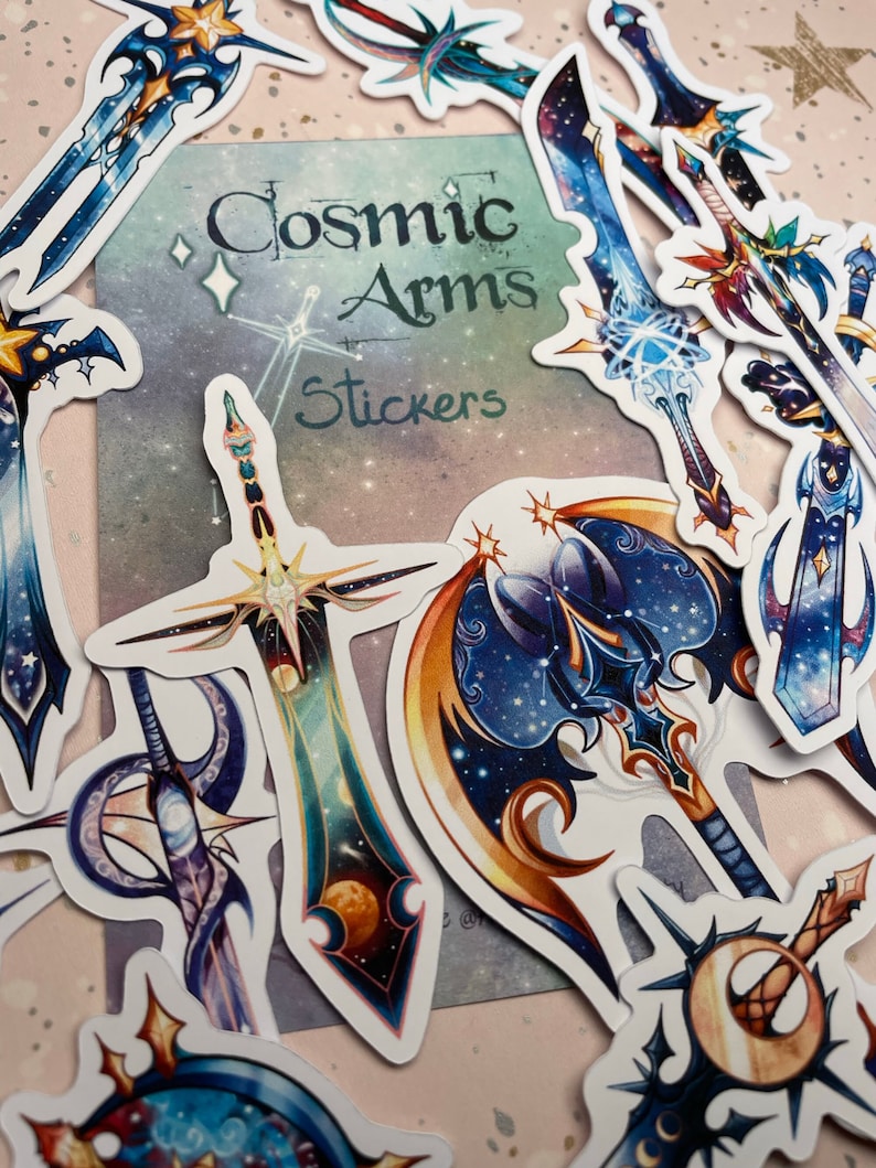 May include: A set of colourful stickers featuring various sword designs with a cosmic theme. The stickers have a galaxy-like pattern with stars and planets. The text "Cosmic Arms Stickers" is visible on the card.
