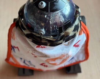 Scoundrel design droid cape - patterned orange and spotted fabric