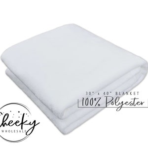 May include: A white, 30" x 40" blanket made of 100% polyester. The blanket is folded in half and lying on a white surface.