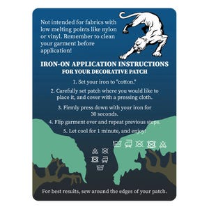 May include: A rectangular instructional card with a blue background featuring a white panther illustration. It provides iron-on application steps for a decorative patch, including temperature settings, pressing times, and care symbols.