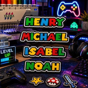May include: Four rectangular embroidered patches featuring the names HENRY, MICHAEL, ISABEL, and NOAH in a multi-colored pixelated font with black borders. Below are three smaller pixel-art patches: a yellow star, a red mushroom, and a blue sword.