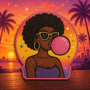 May include: Embroidered patch featuring a Black woman with sunglasses blowing a bubblegum bubble. The patch has a retro design with a sunset background, palm trees, and a city skyline. The woman is wearing gold hoop earrings and a purple top.