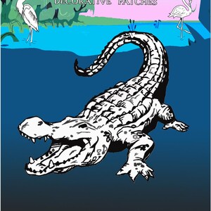 May include: Decorative patch featuring a stylized black and white alligator with an open mouth, set against a blue and teal background. The patch includes the text "BLUE HERON DECORATIVE PATCHES" and illustrations of a heron and a flamingo.