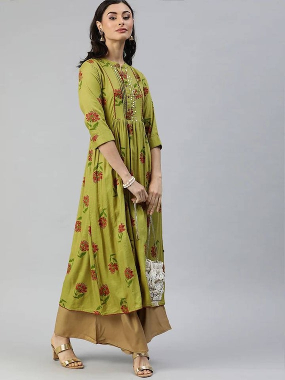 Peach Women Front Slit Kurti at best price in Gurgaon by Global Connections  | ID: 2849668848562