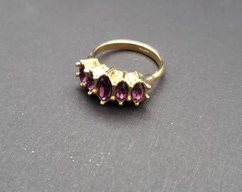 Avon purple stone marquis sparkle Ring size 8 never been worn  R18 in box