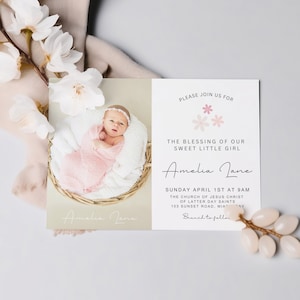 May include: A baby shower invitation with a pink and white floral design. The invitation reads "Please join us for the blessing of our sweet little girl Amelia Jane. Sunday April 1st at 9am. The Church of Jesus Christ of Latter Day Saints. 103 Sunset Road, MIAT. Branch to follow."