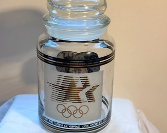 VINTAGE 1984 US Treasury’s Olympics Los Angeles Commemorative Coins glass canister / collectible jar