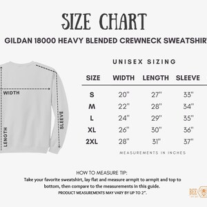 May include: Size chart for a Gildan 18000 heavy blended crewneck sweatshirt. The chart shows unisex sizing with measurements in inches for width, length, sleeve, and chest for sizes S, M, L, XL, and 2XL.