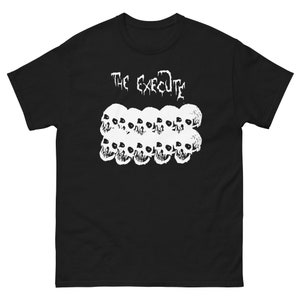 May include: Black t-shirt with a white graphic of skulls and the text "THE EXECUTE"