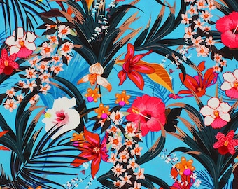 May include: A vibrant blue background with a tropical floral print featuring pink, red, orange, and white flowers. The print includes palm leaves and other tropical foliage.