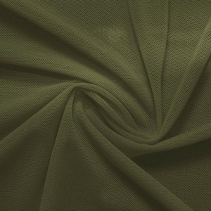 May include: A close-up of a piece of olive green mesh fabric. The fabric has a fine, even weave and is slightly wrinkled.
