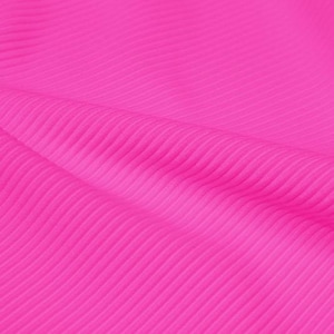 May include: A close-up of a bright pink ribbed fabric. The fabric has a smooth texture and a slight sheen.