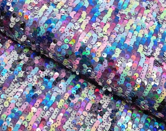 Space Jam stretchigt nättyg med paljetter | Blue Moon Fabrics