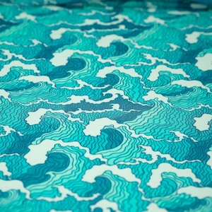 A flat sample of Crazy Waves Printed Power Mesh