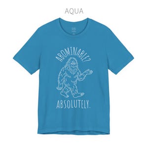 Abominable? Absolutely Yeti Tee | Funny Bigfoot Shirt | Cryptid Top | Unisex Jersey Tee Aqua