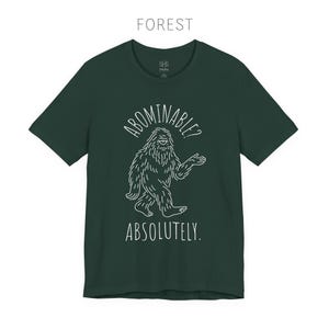 Abominable? Absolutely Yeti Tee | Funny Bigfoot Shirt | Cryptid Top | Unisex Jersey Tee Forest