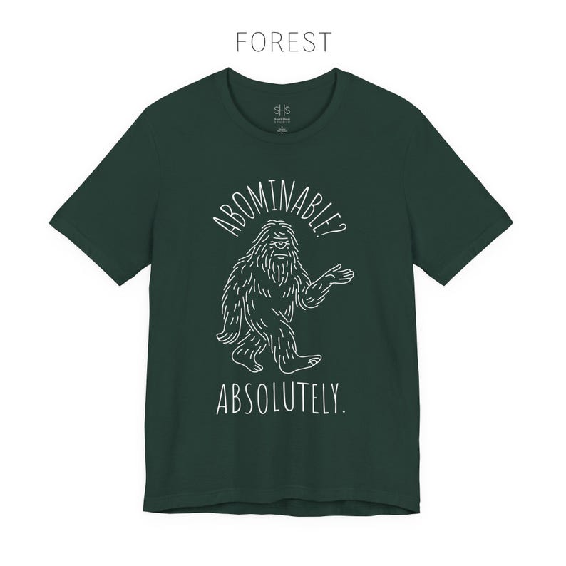 Abominable? Absolutely Yeti Tee | Funny Bigfoot Shirt | Cryptid Top | Unisex Jersey Tee Forest