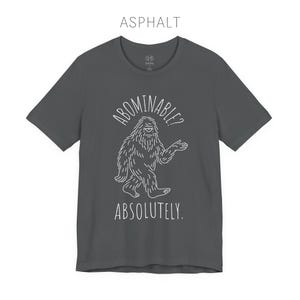 Abominable? Absolutely Yeti Tee | Funny Bigfoot Shirt | Cryptid Top | Unisex Jersey Tee Asphalt
