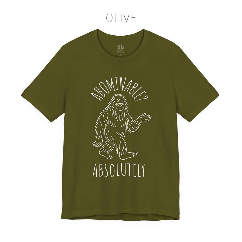 Abominable? Absolutely Yeti Tee | Funny Bigfoot Shirt | Cryptid Top | Unisex Jersey Tee Olive