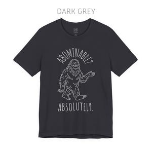 Abominable? Absolutely Yeti Tee | Funny Bigfoot Shirt | Cryptid Top | Unisex Jersey Tee Dark Grey