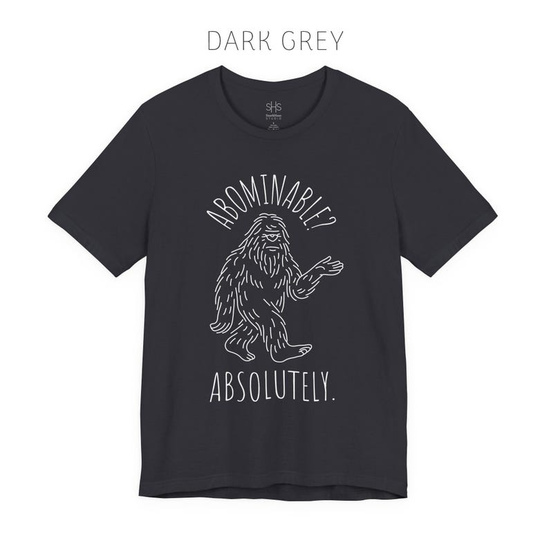 Abominable? Absolutely Yeti Tee | Funny Bigfoot Shirt | Cryptid Top | Unisex Jersey Tee Dark Grey