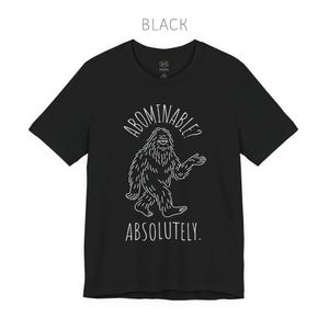 Abominable? Absolutely Yeti Tee | Funny Bigfoot Shirt | Cryptid Top | Unisex Jersey Tee Black