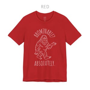 Abominable? Absolutely Yeti Tee | Funny Bigfoot Shirt | Cryptid Top | Unisex Jersey Tee Red