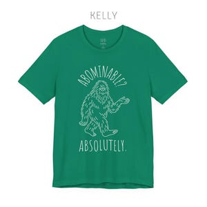 Abominable? Absolutely Yeti Tee | Funny Bigfoot Shirt | Cryptid Top | Unisex Jersey Tee Kelly