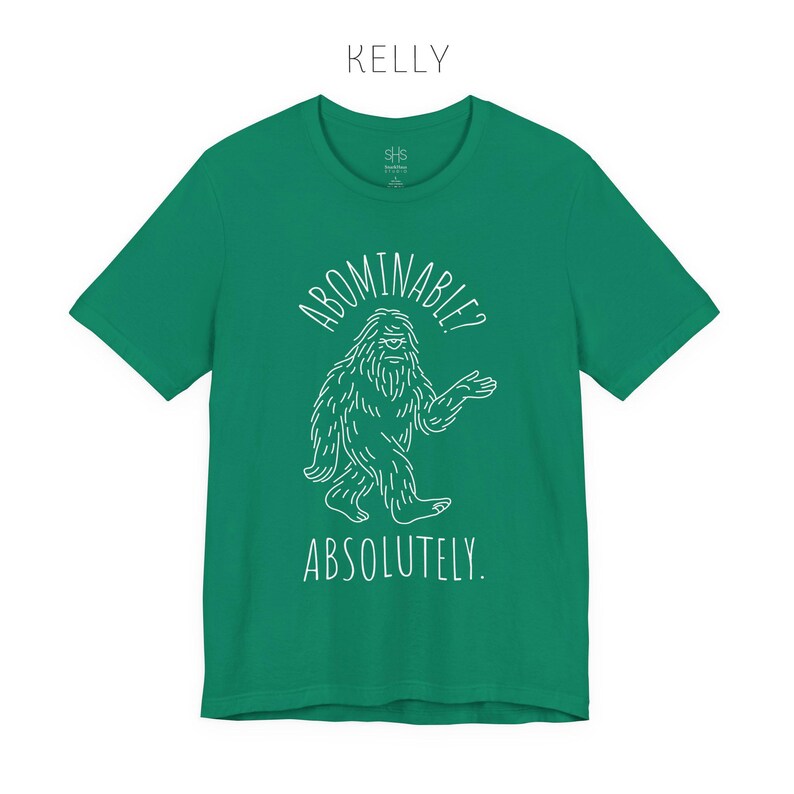 Abominable? Absolutely Yeti Tee | Funny Bigfoot Shirt | Cryptid Top | Unisex Jersey Tee Kelly