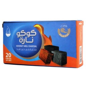 May include: A blue box with a red and orange design. The box contains 20 pieces of coconut shell charcoal. The text on the box reads "Koko Nara" and "Coconut Shell Charcoal".