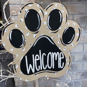 Porta a forma di zampa di cane