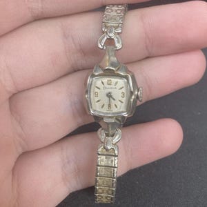 Vintage Bulova Women&#39;s Manual Wind Watch 10k Rolled Gold Plated Bezel Silver Tone Bracelet White Dial Pre-Owned.  Works Great!