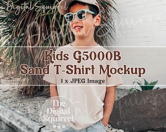 Kids Gildan 5000B Sand T-Shirt Mockup | Outdoor Summer Mock Up Photo of a Boy wearing a G500B Youth Tee | JPEG File
