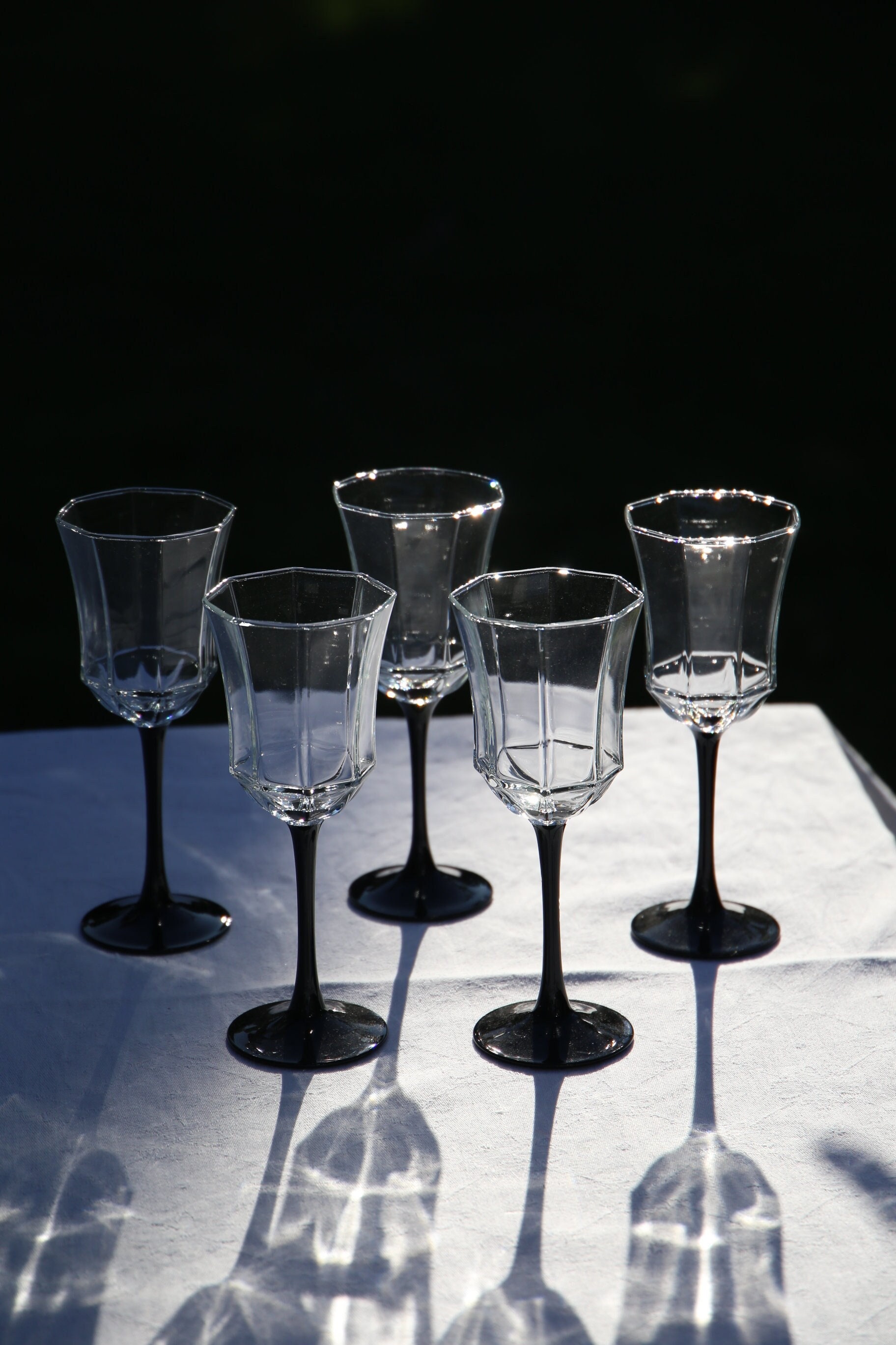 An Alluring and Rare Set of 7 Vintage French Luminarc Octime Tall Wine  Glasses with Oil Black Skinny Stems and Limited Edition Bevel Cut…
