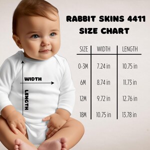 May include: A baby wearing a white onesie is featured in this image. The text "RABBIT SKINS 4411 SIZE CHART" is at the top. A size chart shows the width and length in inches for sizes 0-3M, 6M, 12M, and 18M.